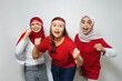 © rizkitripujiw - happiness of a group of young people using the red and white attributes to commemorate independence day