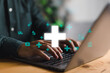 The healthcare icon is represented by a plus sign and a man typing on a laptop computer. A health concept is health insurance. access to welfare and health