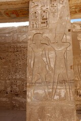 Wall Mural - Inscriptions on the columns of the mortuary temple of Medinet Habu in Luxor in Egypt