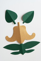 Poster - leaves, upside down finial, and decorative foliage made of paper on white