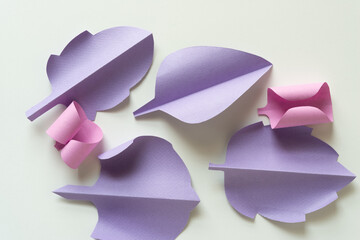 Canvas Print - curled and folded foliage-inspired leaves and shapes in pink and violet on blank paper