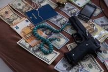 Wallet With Money Out Of A Murder Evidence Bag, Conceptual Image