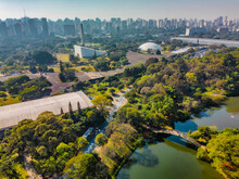Aerial View Of Sao Paulo City, Next To Ibirapuera Park. Prevervetion Area With Trees And Green Area Of Ibirapuera Park In Sao Paulo City, Brazil.