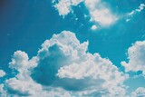 Fototapeta Natura - cloudy blue sky with air. The backdrop of the sky is blue. Text, design, fashion, businesses, bloggers, publications, websites, internet marketers, brands, models, and animation. Generative AI