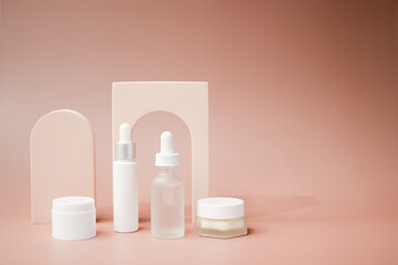 Wall Mural - beauty product and mock-up skincare container on a pastel display background. 