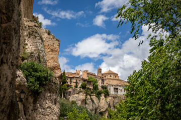 Sticker - Beautiful partial view between trees and rocks of the Unesco heritage monumental city of Cuenca, Spain