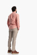© Viorel Sima - back view of smart casual guy holding hands in pockets and standing