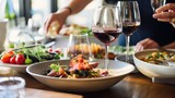 Fototapeta Londyn -  a table topped with plates of food and glasses of wine next to a bowl of salad and a glass of wine on top of a table.  generative ai