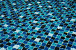 © SU CrossCutting Film - Water surface with waves on water surface wave effect You can see the blue square tiles at the bottom of the pool.