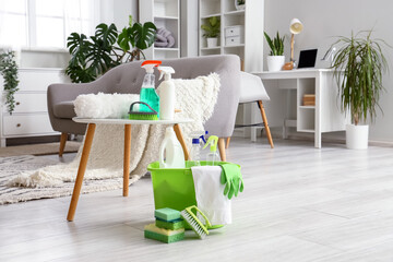 Poster - Table with cleaning supplies in living room