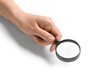 © Pixel-Shot - Female hand with mini magnifier isolated on white background