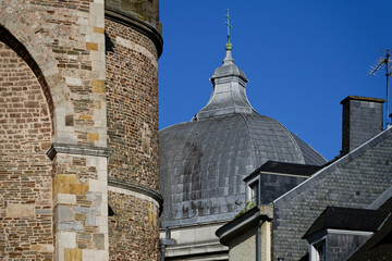 Wall Mural - details of the masonry of the aachen cathedral on a sunny day against a blue sky