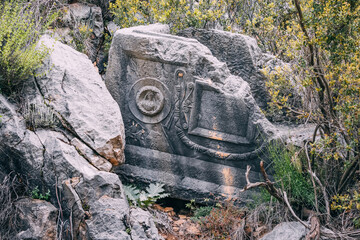 Wall Mural - Lycian tomb and grave at the ancient greek ruined town in Turkey