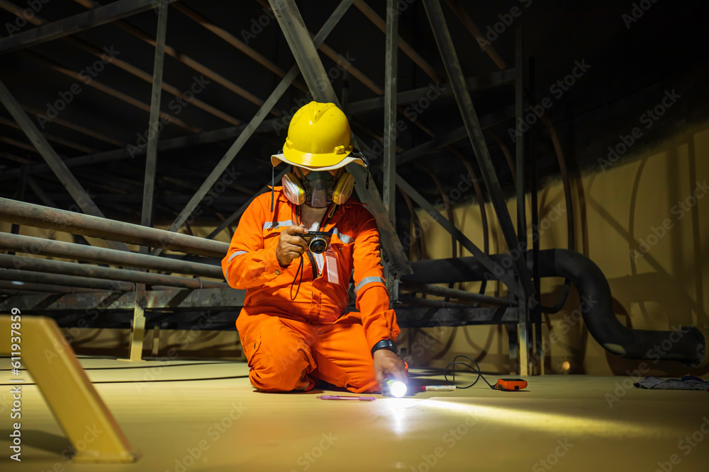 Visual Inspection Flashlight Male worker inspection at a surface painting color test of visual check ...