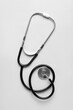 © Pixel-Shot - Modern stethoscope on  light background