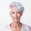 © Rawf8 - Portrait of a senior woman with pastel color short hair smiling isolated on white. Generative AI