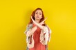 © Jihan - young beautiful red haired woman Rejection expression crossing arms doing negative sign, angry face