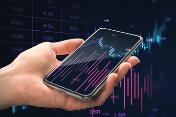 Canvas Print - Close up of woman's hand holding smartphone with glowing candlestick index forex chart on blurry background. Investment, profit and financial growth concept. Double exposure.