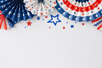 Wall Mural - 4th of July party concept. Top view flat lay of paper fans, star-shaped confetti on white background with blank space for text or ads