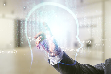 Wall Mural - man hand working with abstract virtual artificial intelligence interface with human head hologram on