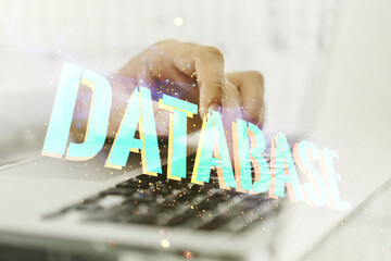 Poster - Double exposure of Database word sign with hands typing on computer keyboard on background, global research and analytics concept