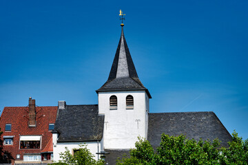 Wall Mural - The church Alt Sankt Maternus in the old historical center of the Cologne district Cologne-Rodenkirchen