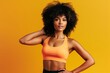 © Road Red Runner - Young black fitness woman poses confident, powerful, on a yellow background. Ai generated.