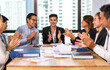 © Art_Photo - Successful of happy group teamwork professional casual business people smiling and laughing to win of celebrating project success.Creative business relaxing and clap hand applause in modern office