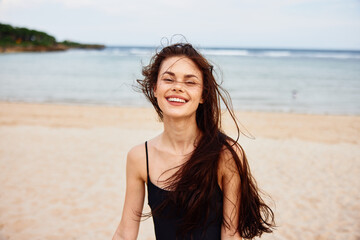 woman sand summer smile nature sea ocean walking young beach vacation