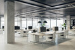 © Who is Danny - Comfortable workplaces in an open office interior with desks, computers, and a window. The design is sleek with a concrete floor and black ceiling. Business background. 3D Rendering