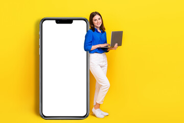 Poster - Full length photo of dreamy sweet lady wear blue shirt typing modern device empty space isolated yellow color background