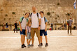 © Tomsickova - European tourist family, visiting Jerusalem, meeting new culture
