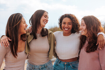 group portrait of happy diverse young women.