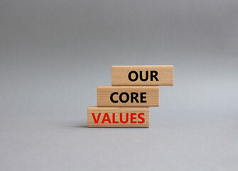 Our core values symbol. Concept words Our core values on wooden blocks. Beautiful grey background. Business and Our core values concept. Copy space.