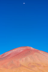 Wall Mural - Moon over mountain in the bolivian plateau