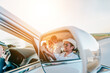 © Garun Studios - Portrait of family enjoying beach trip with their favorite car.