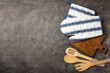 Kitchenware. Oven glove and potholder for hot dishes on a marble textured background. close-up. Place for text. copy space.