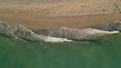 Sticker - Aerial view of the sandy beach with soft sea waves in Malaga, Spain