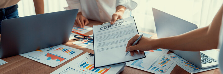 Poster - Panorama shot hand signing signature on legal contract, business report and BI Fintech paper on table. Seal business agreement deal with signature. Investment loan for startup company. Scrutinize
