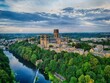 Aerial view of the Durham Cathedral, castle and river on a sunset