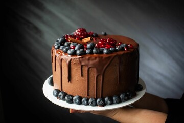 Canvas Print - Chocolate cake with blueberries and cinnamon topping