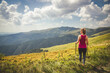 © nickolya - Young woman n the top of the mountains