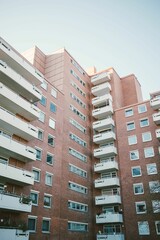 Vertical Shot of a prefabricated house in the hood under a blue sky