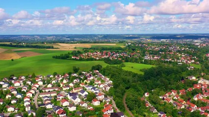 Sticker - Beautiful view of countryside fields and rural houses  with cloudy sky in Landshut, Germany