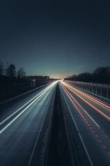 Wall Mural - Vertical shot of car lights on roads with long exposure effect during nighttime