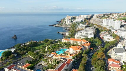 Sticker - Aerial view of Funchal cityscape on the Madeira Island at daytime under a blue sky in Portugal