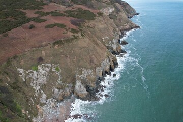 Poster - Aerial view of a deserted rocky coastline