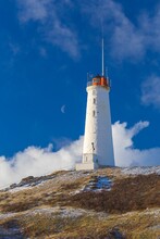 Vertical Shot Of The Reykjanesviti Lighthouse During The Daytime In Iceland