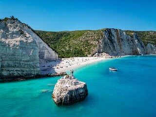 Sticker - (4K) Couple holding hands at Fteri Beach, Kefalonia, Cephalonia, Greece