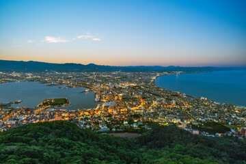 Sticker - Night View from Mount Hakodate, Goryokaku Tower in Hokkaido, Japan.